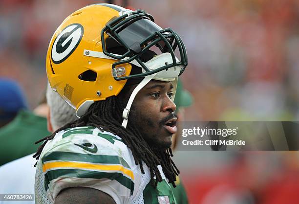 Running back Eddie Lacy of the Green Bay Packers watches from the sideline against the Tampa Bay Buccaneers at Raymond James Stadium on December 21,...