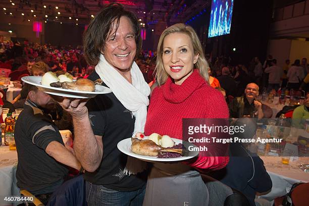 Juergen Drews and Ramona Drews attend the Charity Dinner for Homeless hosted by Frank Zander at the Estrel Hotel in Berlin on December 22, 2014 in...