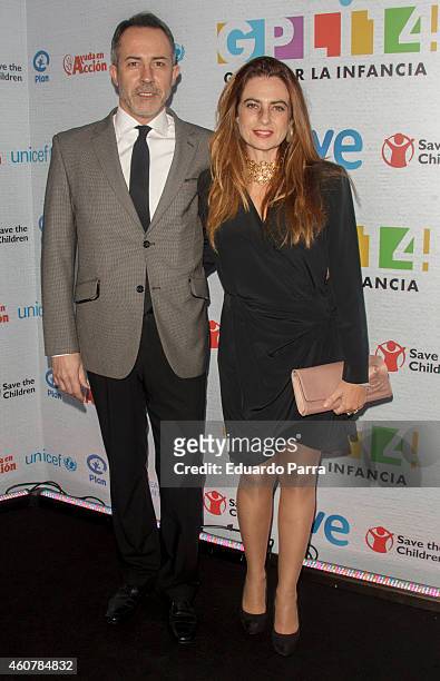 Actress Lola Baldrich and Jose Navar attend the Gala for Children photocall at Magarinos sports center on December 22, 2014 in Madrid, Spain.