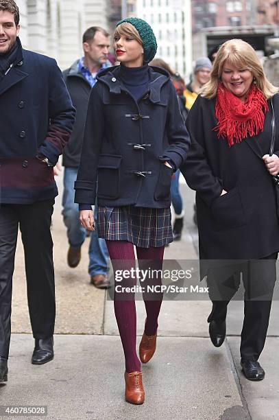 Singer Taylor Swift and mother Andrea Finlay are seen on December 22, 2014 in New York City.