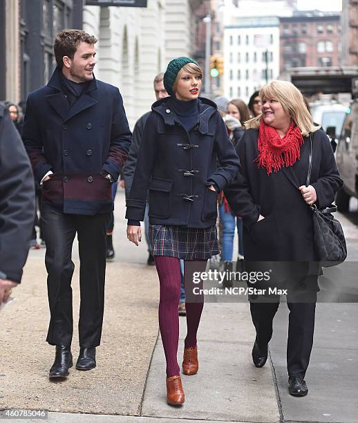 Austin Swift, Singer Taylor Swift and mother Andrea Finlay are seen on December 22, 2014 in New York City.