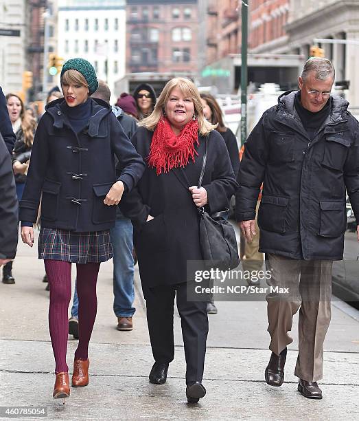 Singer Taylor Swift and mother Andrea Finlay are seen on December 22, 2014 in New York City.