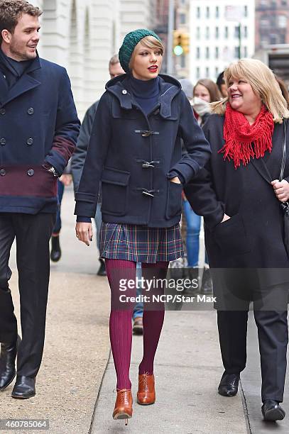 Austin Swift, Singer Taylor Swift and mother Andrea Finlay are seen on December 22, 2014 in New York City.