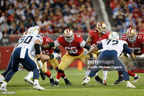 Marcus Martin and Mike Iupati of the San Francisco 49ers block during the game against the San Diego Chargers at Levi Stadium on December 20, 2014 in...