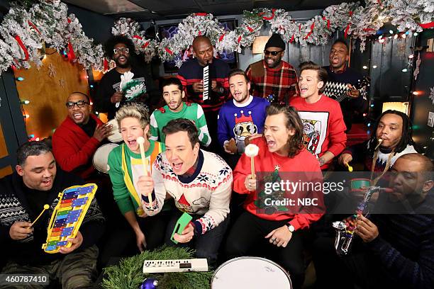 Episode 0185 -- Pictured: Host Jimmy Fallon and The Roots sing "Santa Claus is Coming to Town" with One Direction members Niall Horan, Zayn Malik,...