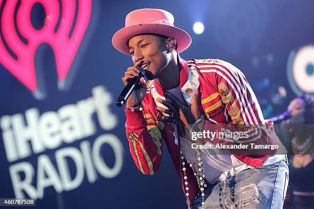 Pharrell Williams performs onstage during 93.3 FLZs Jingle Ball 2014 at Amalie Arena on December 22, 2014 in Tampa, Florida.