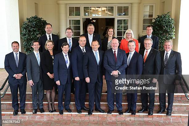 The new Abbott Ministry poses for media with Prime Minister Tony Abbott and Governor-General Peter Cosgrove at Government House on December 23, 2014...