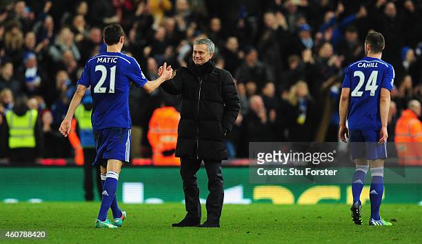 Chelsea player Nemanja Matic is congratulated by his mananger Jose Mourinho after the Barclays Premier League match between Stoke City and Chelsea at...