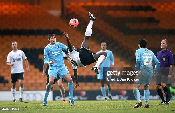 Anthony Griffith of Port Vale clears the ball with a bicycle kick during the Budweiser FA Cup third round match between Port Vale and Plymouth Argyle...