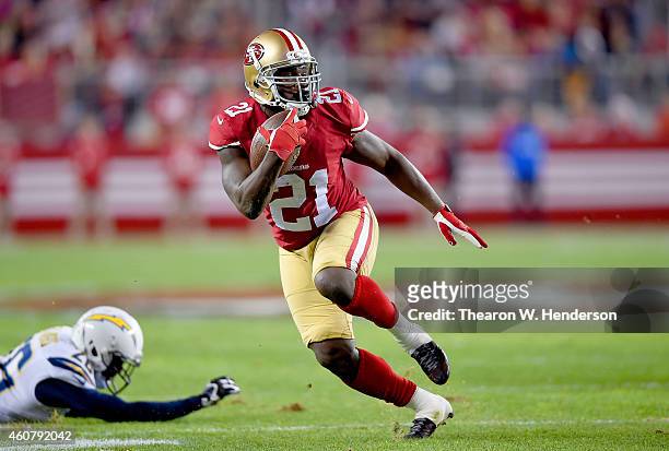 Frank Gore of the San Francisco 49ers carries the ball against the San Diego Chargers at Levi's Stadium on December 20, 2014 in Santa Clara,...