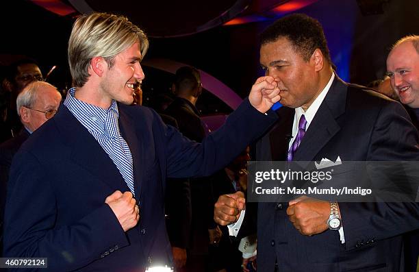 David Beckham and Muhammad Ali, winner of the BBC's Sports Personality of the Century Award, pretend to box as they attend the BBC Sports Personality...