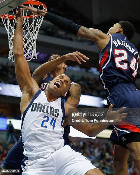 Richard Jefferson of the Dallas Mavericks draws the foul from Thabo Sefolosha of the Atlanta Hawks in the second half at American Airlines Center on...