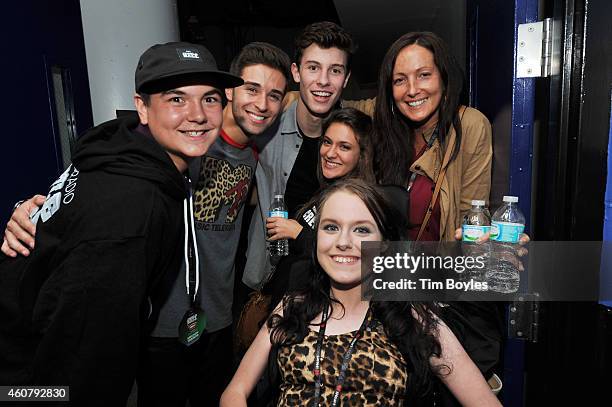 Jake Miller and Shawn Mendes pose with fan Misty Short at 93.3 FLZs Jingle Ball 2014 at Amalie Arena on December 22, 2014 in Tampa, Florida.