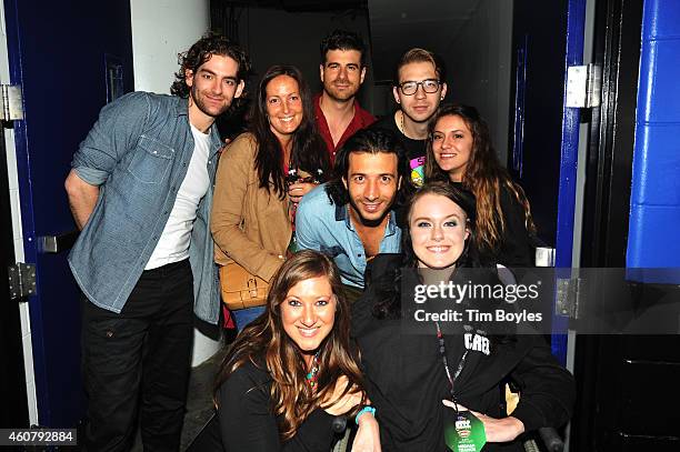 Alex Tanas, Ben Spivak, Nasri and Mark Pellizzer of Magic! pose with fan Misty Short at 93.3 FLZs Jingle Ball 2014 at Amalie Arena on December 22,...