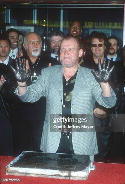 Singer Joe Cocker is inducted to Hollywood's Rock Walk on April 1, 1998 at the Guitar Center in Hollywood, California.