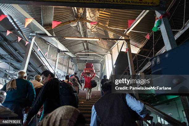 passengers arriving at allahabad station, india. - allahabad city stock pictures, royalty-free photos & images