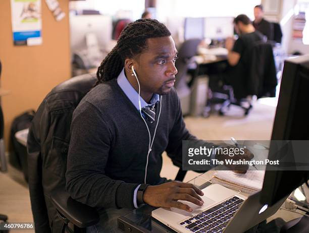 Former NFL wide receiver Donte Stallworth is shown taking part in a internship at the Huffington Post in Washington DC, December 19, 2014