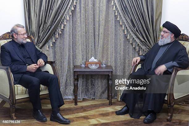 Hezbollah Secretary-General Hassan Nasrallah meets with speaker of Iran's parliament Ali Larijani in Beirut capital of Lebanon on December 22, 2014.