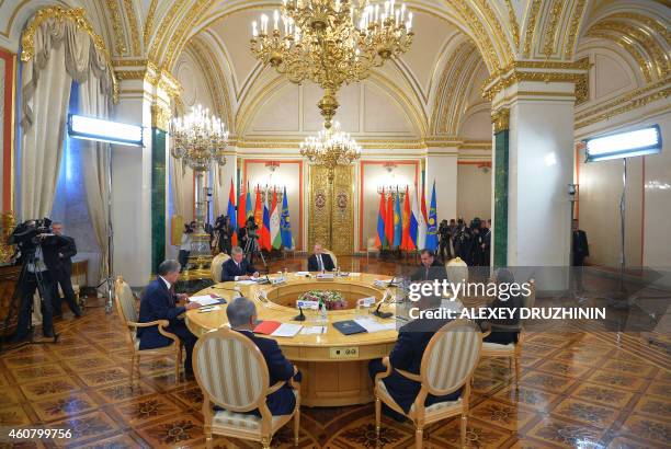 Kyrgyz President Almazbek Atambayev, Collective Security Treaty Organisation secretary general Nikolai Bordyuzha, Russian President Vladimir Putin,...