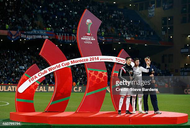 Sergio Ramos of Real Madrid CF poses with Cristiano Ronaldo of Real Madrid CF and Ivan Vicelich of Auckland City after the FIFA Club World Cup Final...