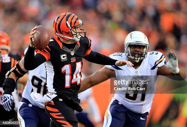 Quarterback Andy Dalton of the Cincinnati Bengals passes against the San Diego Chargers during a Wild Card Playoff game at Paul Brown Stadium on...