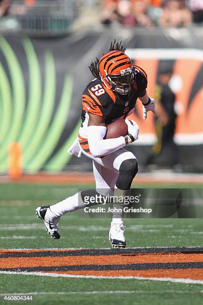Emmanuel Lamur of the Cincinnati Bengals runs the football upfield during the game against the Baltimore Ravens at Paul Brown Stadium on October 26,...