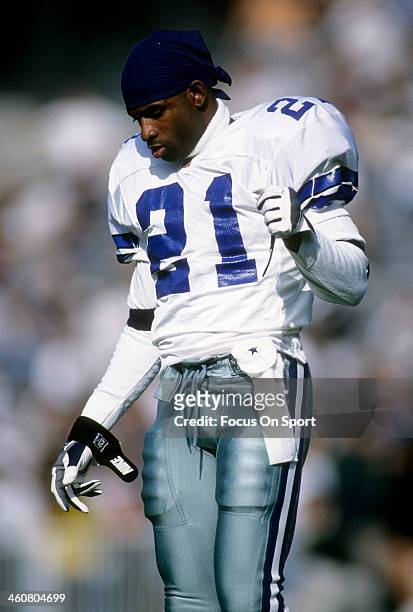 Defensive back Deion Sanders of the Dallas Cowboys on the field during pre-game warm-up circa 1996 before an NFL football game. Sanders played for...