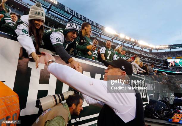 Head coach Rex Ryan of the New York Jets greets fans after a game against the Cleveland Browns on December 22, 2013 at MetLife Stadium in East...