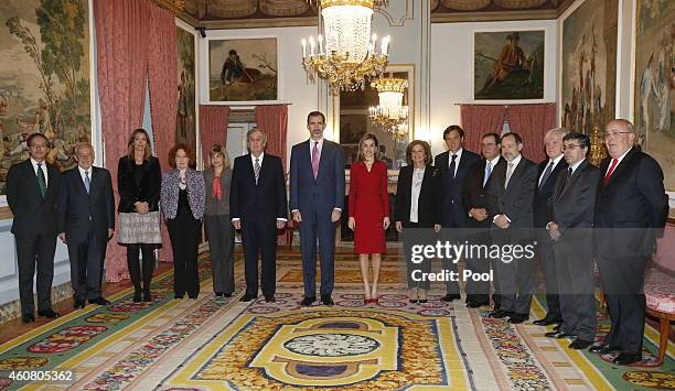 King Felipe VI of Spain and Queen Letizia of Spain pose with the mayor of Madrid, Ana Botella , and members of the Board of Directors of National...