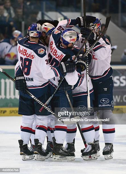 Toni Ritter of EHC Red Bull Muenchen celebrates as he scores their first goal during the DEL Ice Hockey match between Iserlohn Roosters and EHC Red...