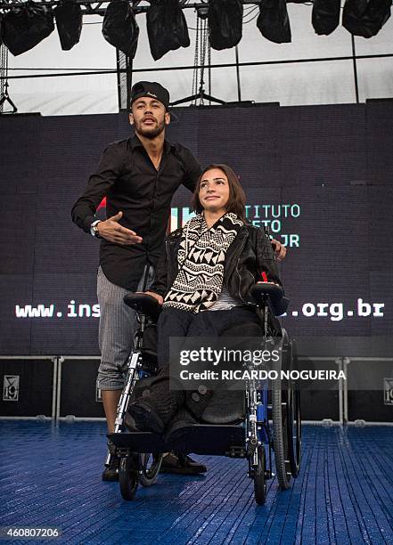 Brazilian player of Barcelona, Neymar , and Brazilian gymnast and skier Lais Souza attend the inauguration of the Neymar Project Institute in Praia...