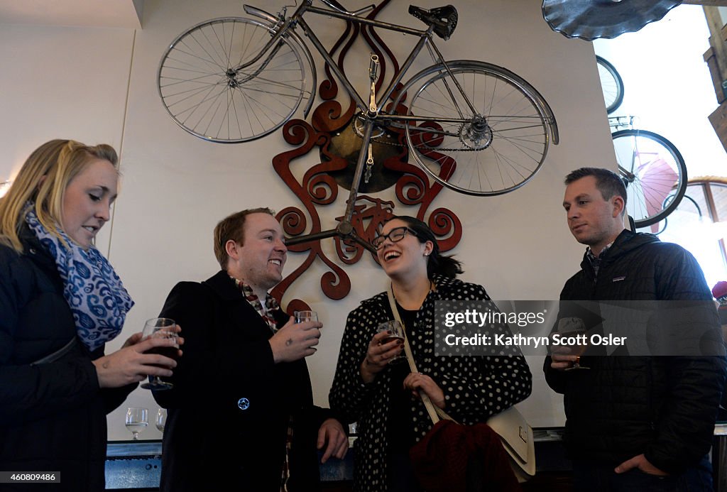 Visitors enjoy a variety of brews inside the New Belgium Brewing Company "Liquid Center" in Fort Collins