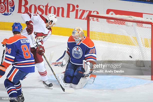 Martin Hanzal of the Arizona Coyotes scores a goal on Ben Scrivens of the Edmonton Oilers on December 23, 2014 at Rexall Place in Edmonton, Alberta,...