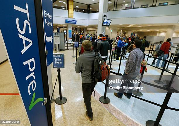 Passenger enters the Transportation Security Administration pre-check line towards a security check point at Salt Lake City International Airport in...