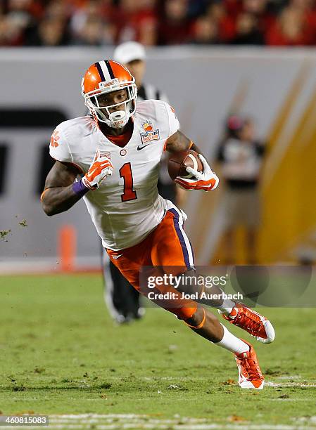 Martavis Bryant of the Clemson Tigers runs with the ball against the Ohio State Buckeyes during the 2014 Discover Orange Bowl at Sun Life Stadium on...