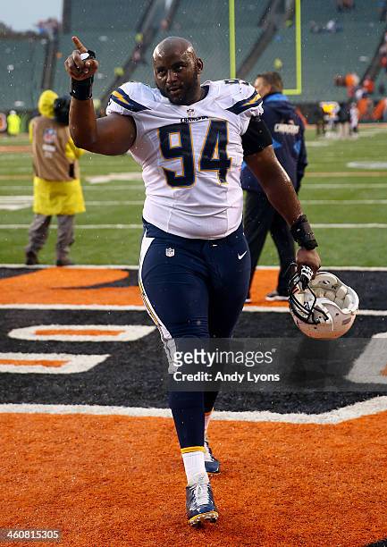 Defensive end Corey Liuget of the San Diego Chargers walks off the field after defeating the Cincinnati Bengals 27-10 in a Wild Card Playoff game at...