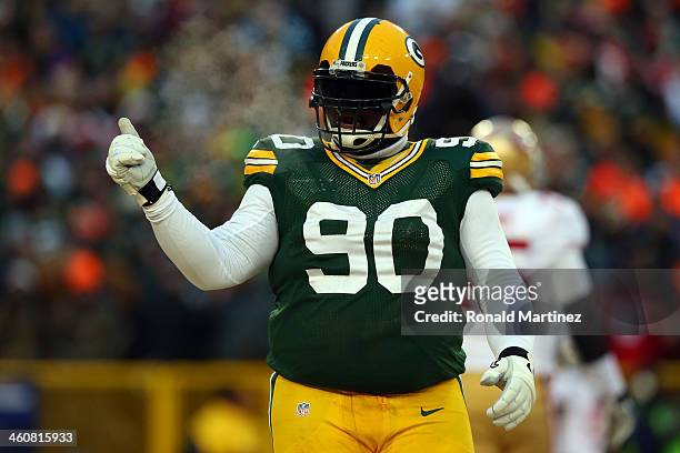 Raji of the Green Bay Packers celebrates a incomplete pass by the San Francisco 49ers in the first quarter during their NFC Wild Card Playoff game at...