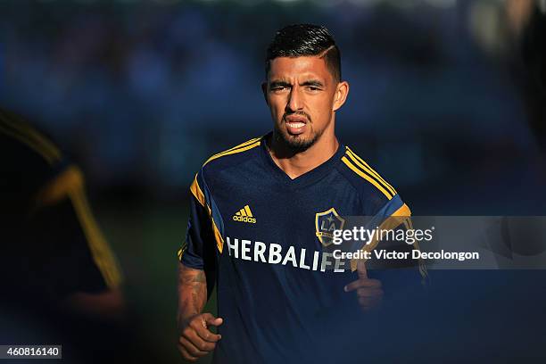DeLaGarza of Los Angeles Galaxy warms up prior to the MLS match against Seattle Sounders FC at StubHub Center on October 19, 2014 in Los Angeles,...