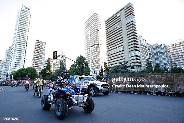 Marcos Patronelli of Argentina and Yamaha Racing Argentina poses before he makes his way to the official podium during the 2014 Dakar Rally Previews...