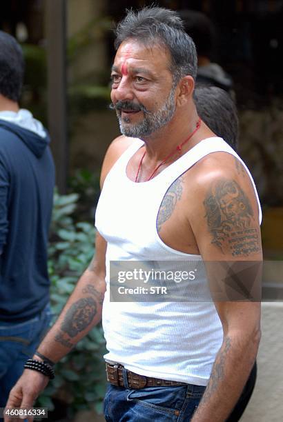 Indian Bollywood film actor Sanjay Dutt arrives at his residence Imperial Heights, Pali Hill Bandra in Mumbai after being granted a 14-day furlough...