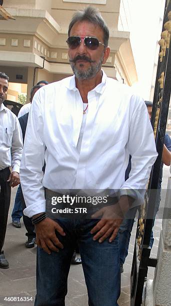 Indian Bollywood film actor Sanjay Dutt arrives at his residence Imperial Heights, Pali Hill Bandra in Mumbai after being granted a 14-day furlough...