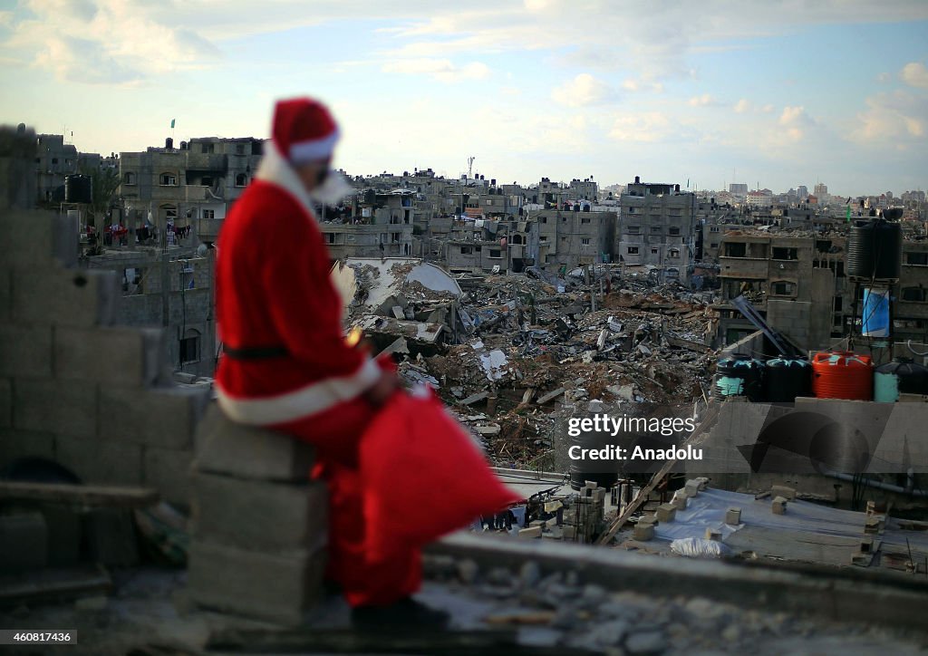 Santa Claus among the ruins of Shujaiyya