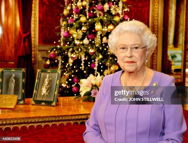 Britain's Queen Elizabeth II is pictured after recording her Christmas Day broadcast to the Commonwealth, in the State Dining Room at Buckingham...