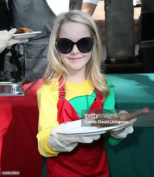 Actress Mckenna Grace attends the Los Angeles Mission Christmas Eve Event for skid row homeless at the Los Angeles Mission on December 24, 2014 in...
