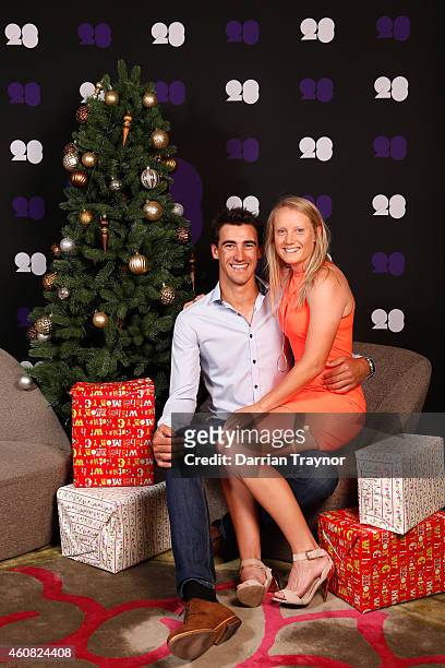 Mitchell Starc and Alyssa Healy pose for a photo during an Australian Test squad Christmas Lunch at Melbourne Cricket Ground on December 25, 2014 in...