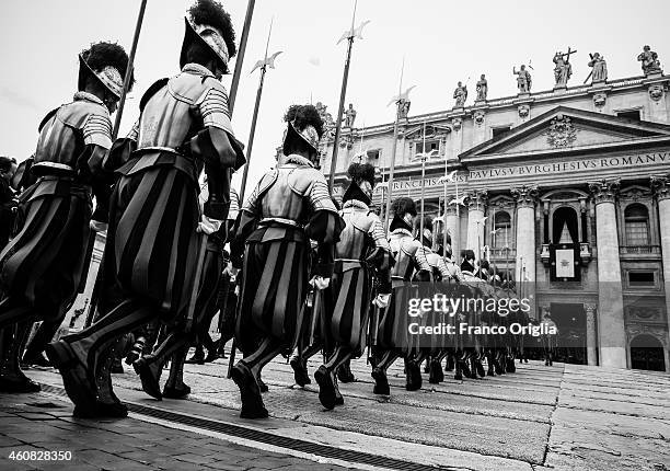 Swiss Guards arrive in St. Peter's Square to attend Pope Francis' Christmas Day message from the central balcony of St Peter's Basilica on December...