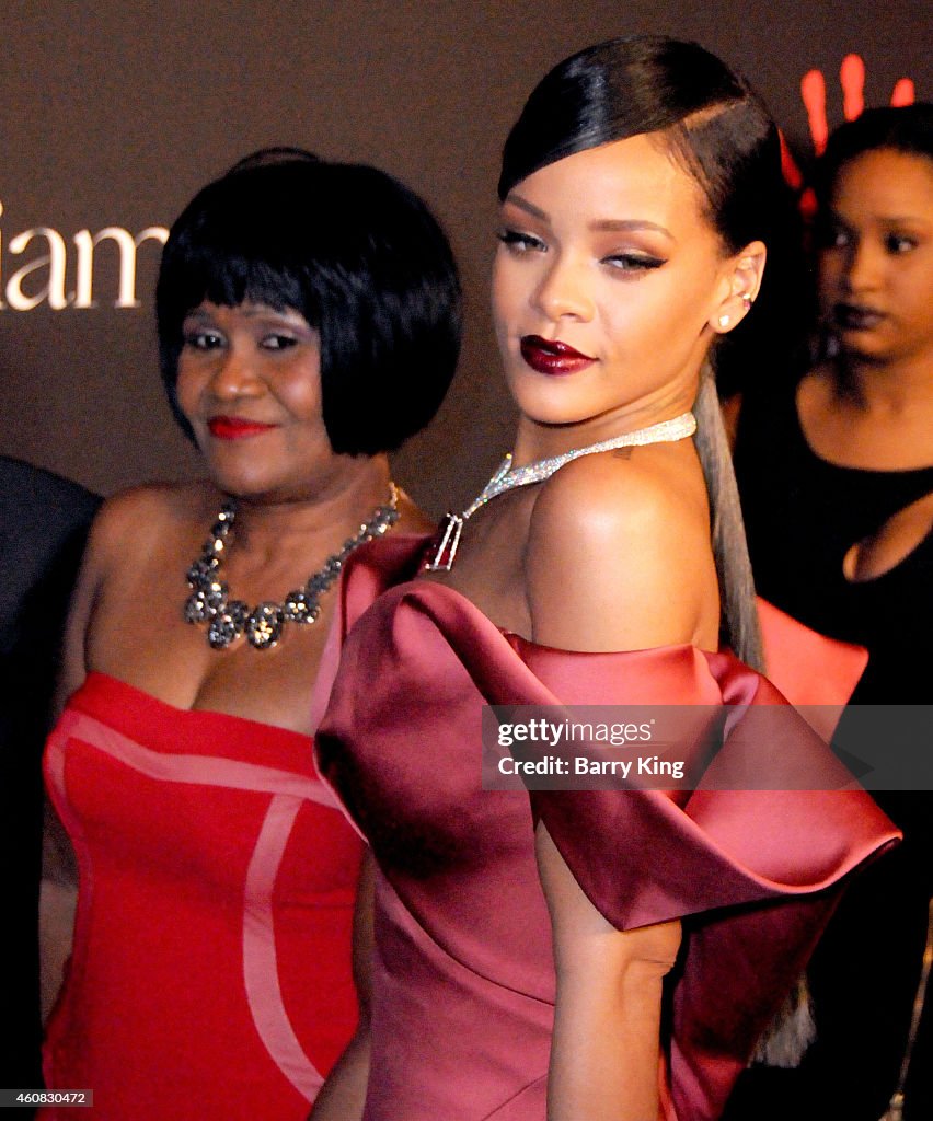 Rahina R Recording Artist Rihanna and mom Monica Braithwaite arrive at... News ...