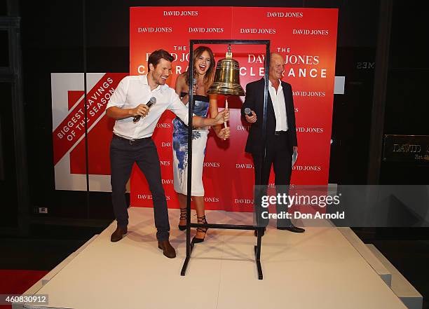 David Jones CEO Iain Nairn looks on as ambassadors Jason Dundas and Jesinta Campbell ring the bell to announce the start of the Boxing Day Sales at...
