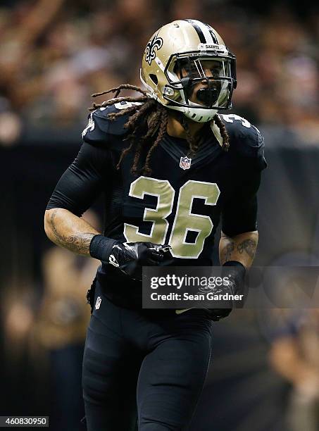 Marcus Ball of the New Orleans Saints warms up prior to a game against the New Orleans Saints at the Mercedes-Benz Superdome on December 21, 2014 in...