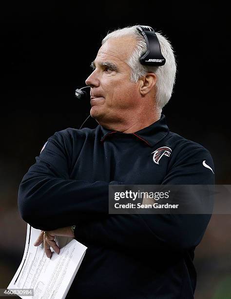 Atlanta Falcons Head coach Mike Smith looks on as his team takes on the New Orleans Saints during a game at the Mercedes-Benz Superdome on December...